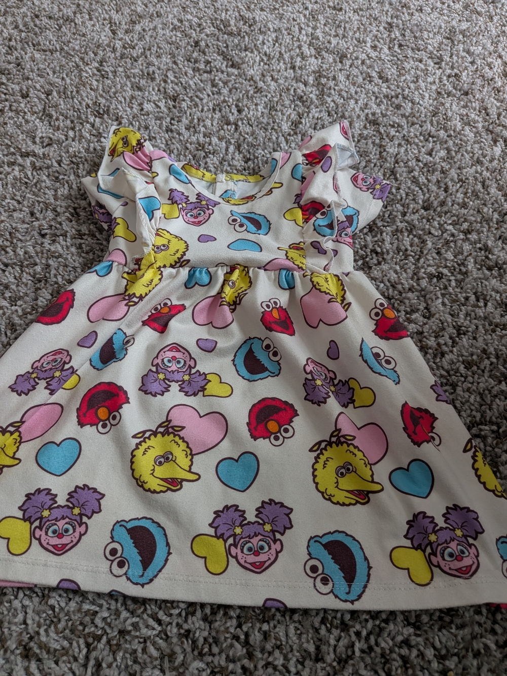Sesame Street Cream Dress with Yellow, Blue, Pink and Red Character Print Size 6